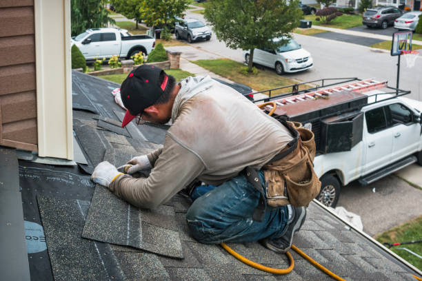 Professional Emergency Roof Repair technician working in Haydenville, MA